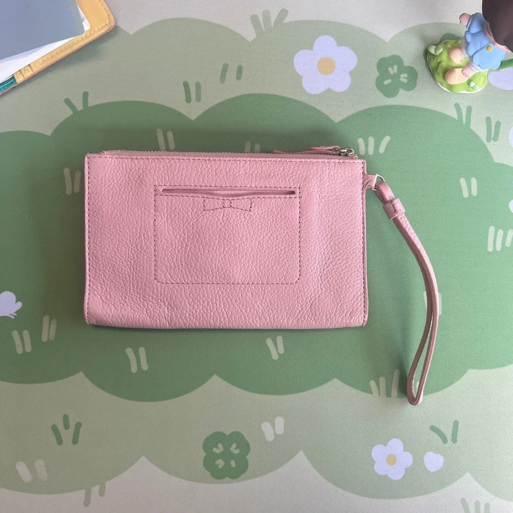 Kate Spade New York Pink Pebbled Leather Bow Wristlet Wallet PWRU4444
